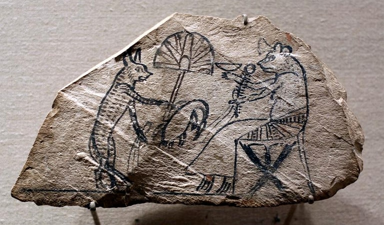 An Egyptian ostracon depicts a cat waiting on a mouse; this is a related scene, not one of the catalogue's named witnesses.