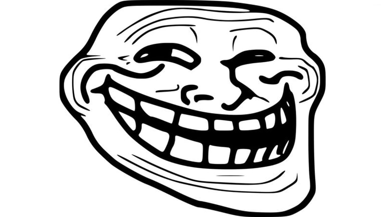 A black and white cartoon face has a wide mischievous grin.